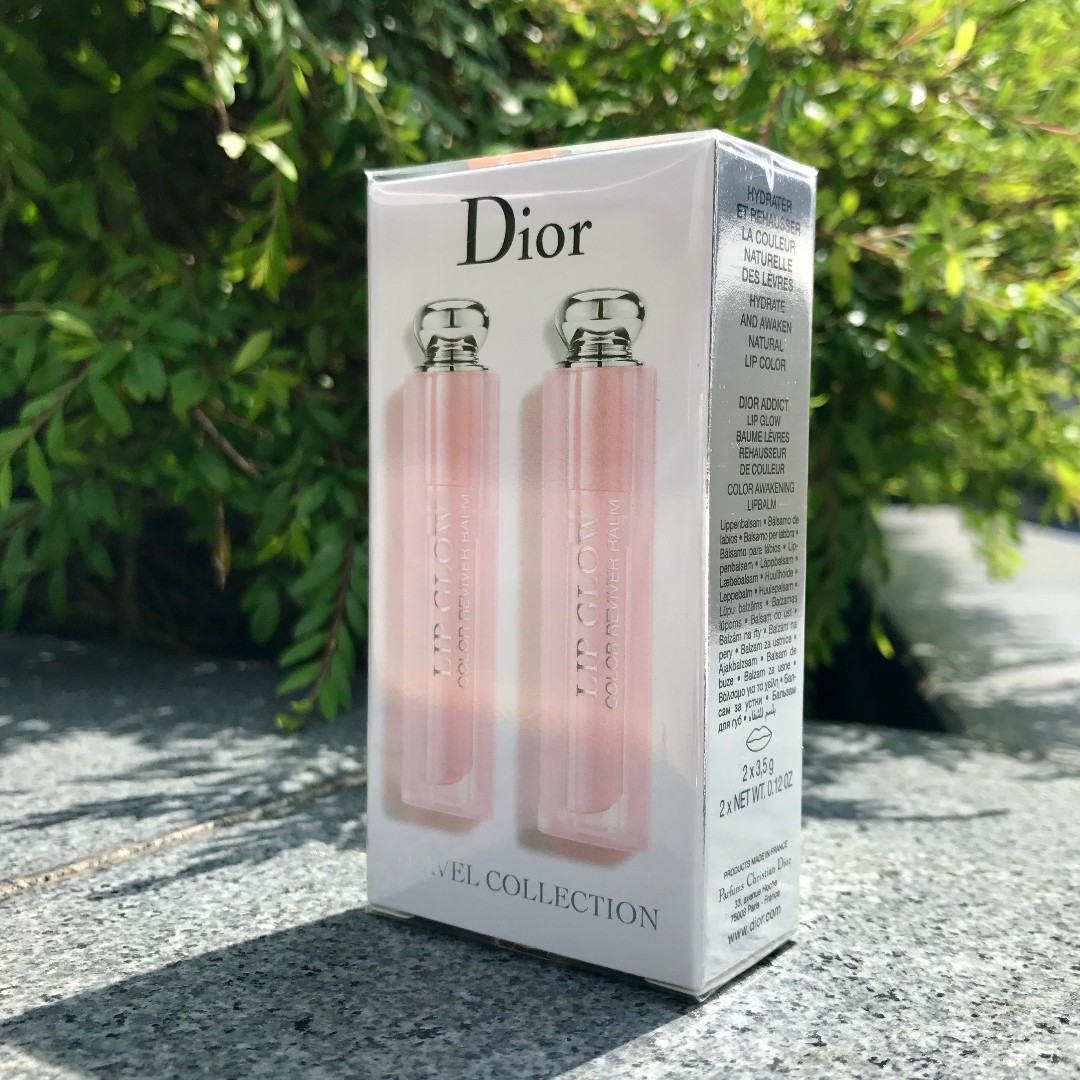 DIOR ADDICT LIP GLOW DUO PINK AND CORAL Set （#001+#004）ขนาด 3.5g.X 2 แท่ง มาเป็นแพ็คคู่ สุดคุ้ม  มี2เฉดสีในแพ็ค Dior Addict Lip Glow 001 #Pink Dior Addict Lip Glow 004 #Coral  Dior Addict Lip Glow  เรียวปากอิ่มเอิบด้วยลิปโกลว์สีชมพูสดใส ลิปบาล์มบำรุงริมฝีปากเนื้อนุ่ม แต่งแต้มความงามด้วยสีสันละมุน เสริมความงามตามธรรมชาติของสีปากดูโดดเด่นขึ้น พร้อมเพิ่มความชุ่มชื่นปรนนิบัติผิวริมฝีปาก ลิปโกล์วจะเปลี่ยนสีไปตามอุณหภูมิของร่างกายโดยอุณหภูมิสูงสีจะเข้มกว่าอุณหภูมิต่ำ ในแพ็คเกจสีชมพูสไตล์เจ้าหญิงแสนหวานเพิ่มความน่ารักให้คุณดูโดดเด่นทุกครั้งที่หยิบใช้  #dior #lipbalm #dioraddictlipglow